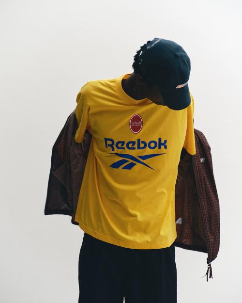 SEDAN ALL-PURPOSE×ReebokのVector Logo S/S Tee