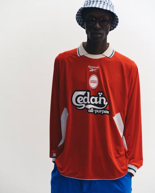 SEDAN ALL-PURPOSE×ReebokのL/S Game Shir