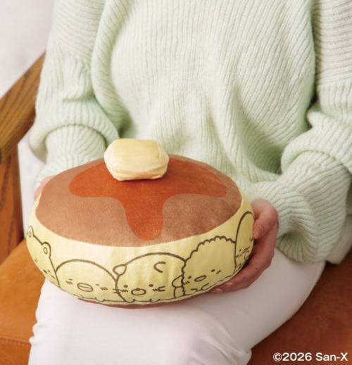 ホットケーキクッションを膝に置いた使用イメージ