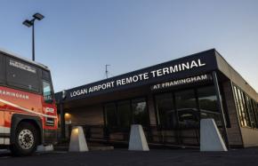 ボストン・ローガン国際空港、北米初の空港外チェックイン施設を開設　保安検査後にバス輸送